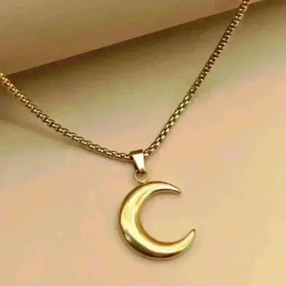 Gold Crescent Moon Necklace on a sleek 18k Gold Filled Chain

24 inches - Picture 1 of 3